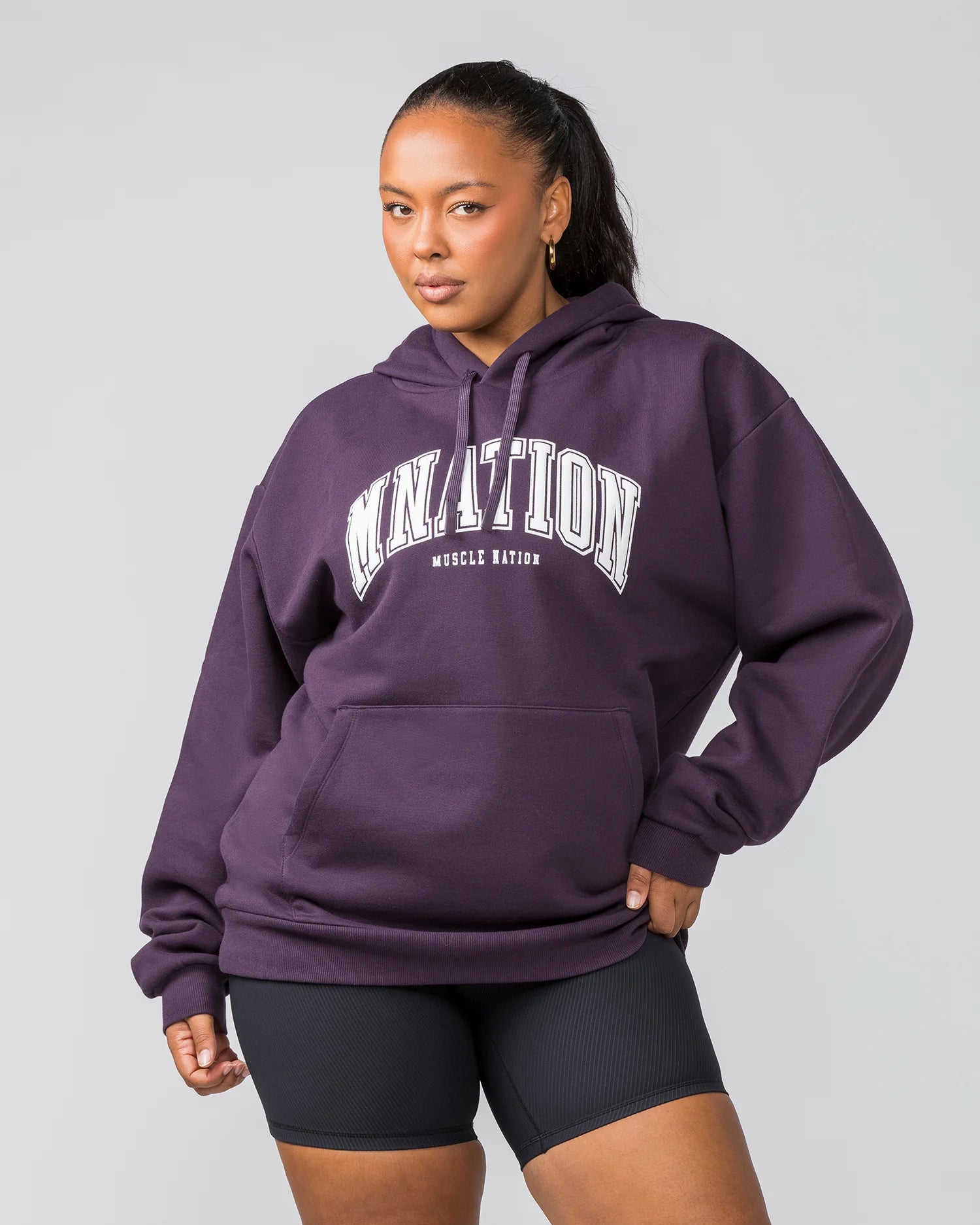 Muscle Nation | Varsity Oversized Hoodie - Midnight Plum Hoodie with Hem Drawcord Adjustable Customizable Muscle Nation | Varsity Oversized Hoodie - Midnight Plum Hoodie with Hem Drawcord Adjustable Customizable