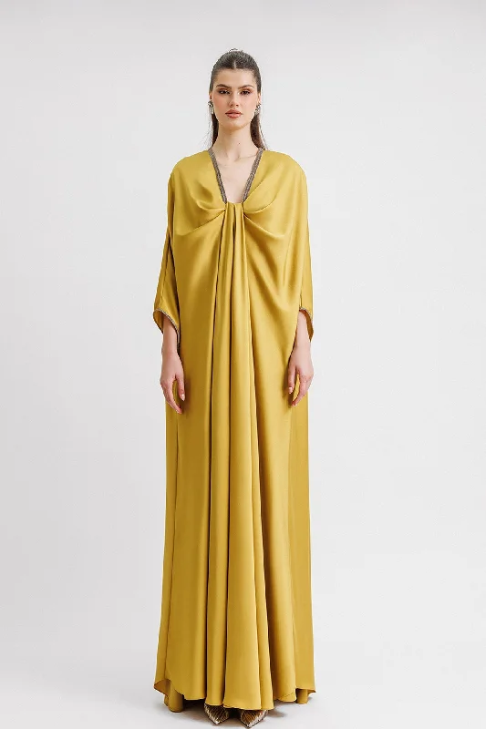 Beaded neckline kaftan style green dress