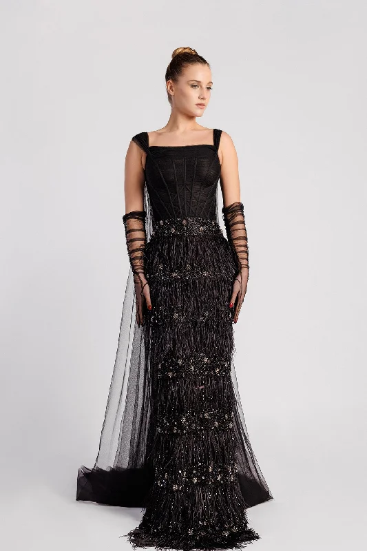 Corseted bodice feathered gown
