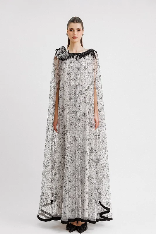 Kaftan style dress featuring beading